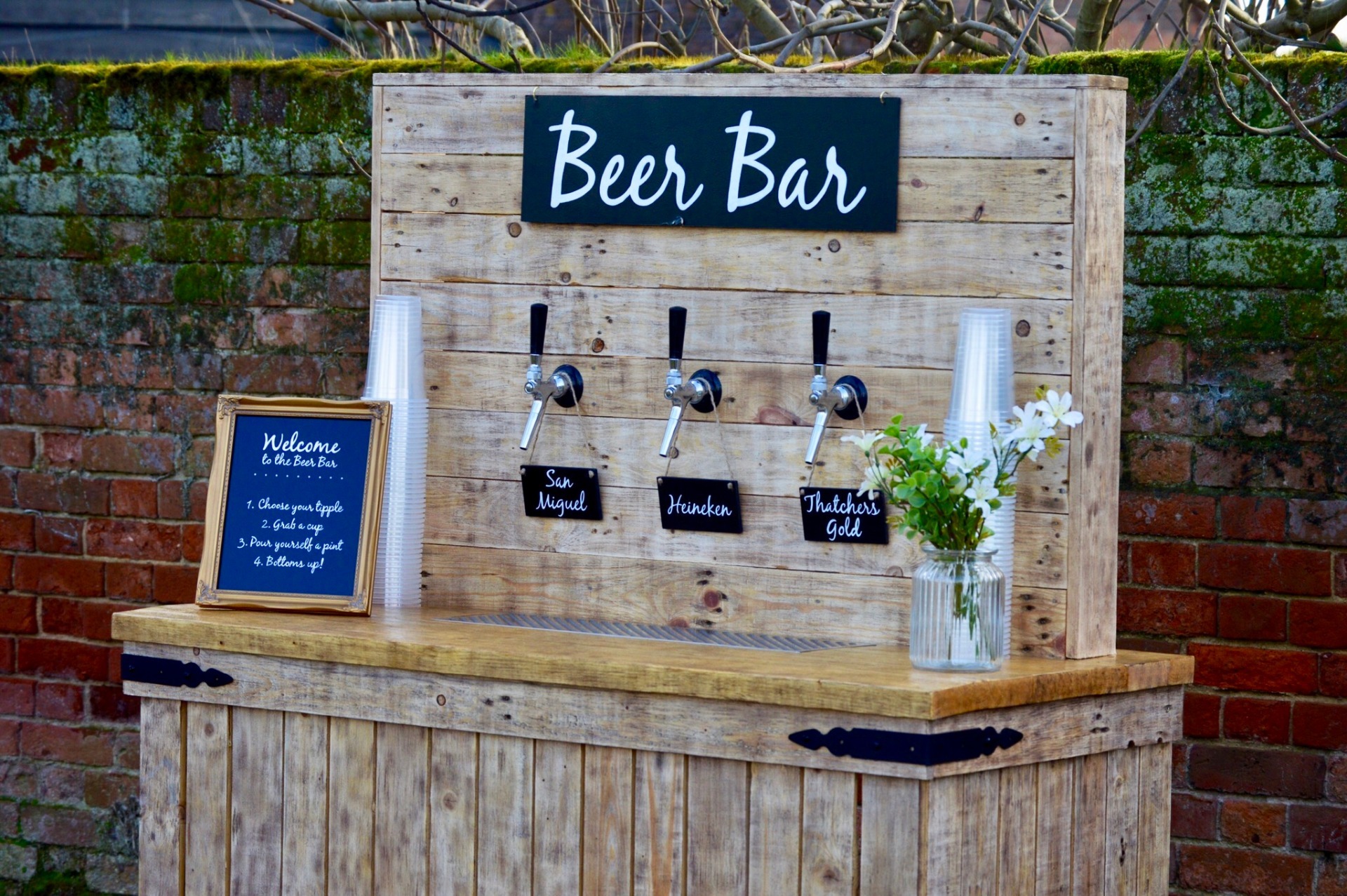 Self serve beer bar at a rustic country wedding